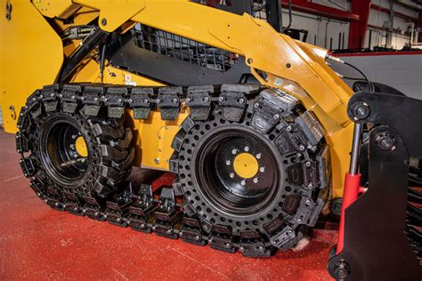 tracks or tires skid steer|bobcat rubber tracks over tires.